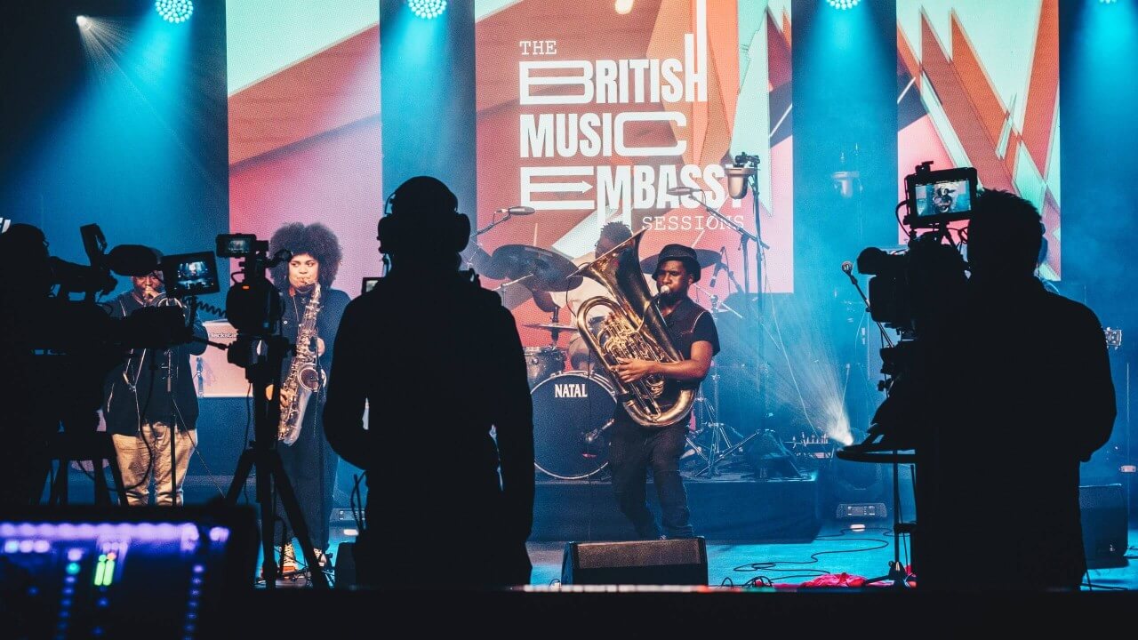 People standing with music instrument